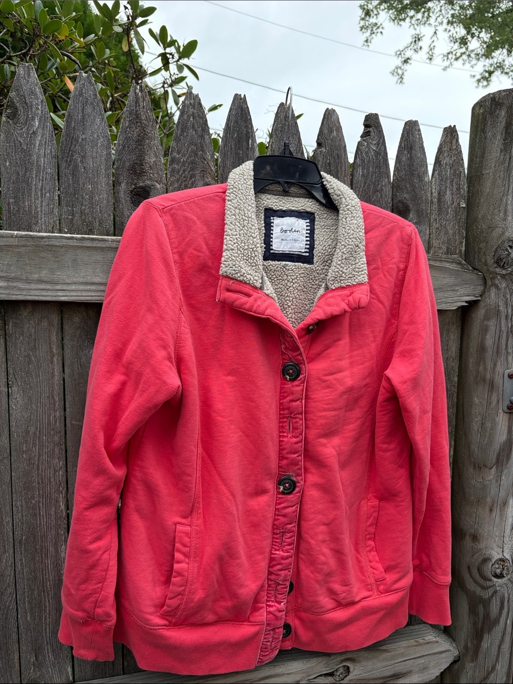 Boden medium strawberry color cotton fleece lined jacket.